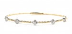 14K TWO TONE STATION FLEXIBLE BANGLE BRACELET