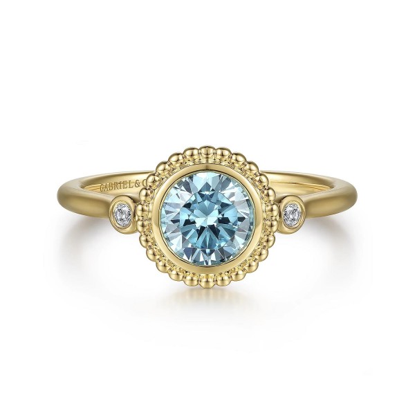 14K YELLOW GOLD .03CTW DIAMOND AND .92CT BLUE TOPAZ RING