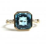 14K YELLOW GOLD DIAMOND AND BLUE TOPAZ RING