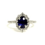 PLATINUM OVAL SAPPHIRE AND DIAMOND RING