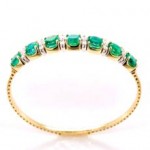 14K YELLOW GOLD DIAMOND AND EMERALD FLEXIBLE BANGLE BRACELET