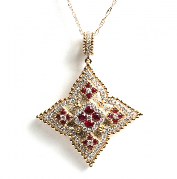 14K TWO TONED DIAMOND AND RUBY STAR PENDANT