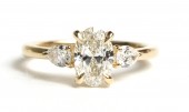 14K Yellow Gold 3 Stone Engagement Ring with Oval Center and Pear Side Diamonds 1.21ctw