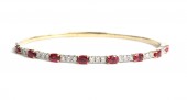 14K YELLOW AND WHITE GOLD DIAMOND AND RUBY FLEXIBLE BANGLE BRACELET