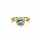 14K YELLOW GOLD SWISS BLUE TOPAZ RING